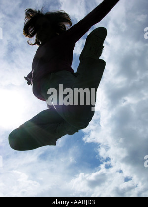 Frau springen Stockfoto