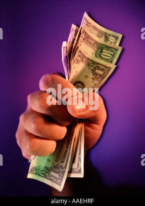 Hand voll Dollar Stockfoto