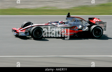 Verdoppeln Sie Fernando Alonso, Formel1 Welt-Motorsport-Champion im McLaren-Mercedes 2007 Auto Stockfoto