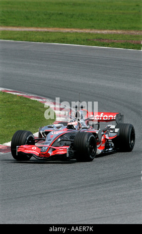 Verdoppeln Sie Fernando Alonso, Formel1 Welt-Motorsport-Champion im McLaren-Mercedes 2007 Auto Stockfoto