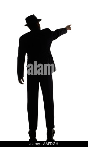 Business Konzept Mann schwarzen Anzug Hut Fedora zeigt stehend bewegt Stockfoto