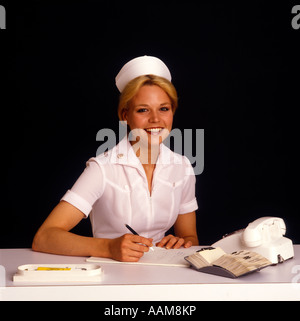 KRANKENSCHWESTER-SITZUNG Stockfoto
