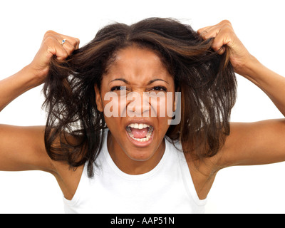 Angry Young Woman ziehen Haar-Modell veröffentlicht Stockfoto