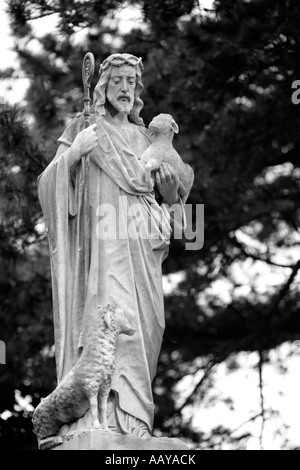 Jesus hält den Lamm Gottes Grabstein Stockfoto