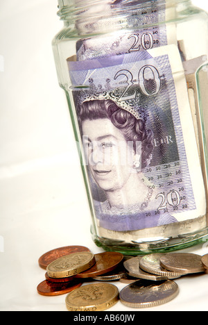 Bargeld in Glas. Stockfoto