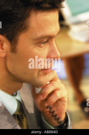 Geschäftsmann mit Telefon Stockfoto