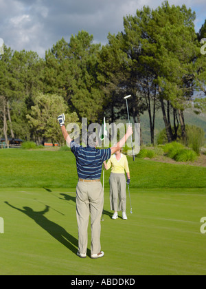 Paar, Golfen Stockfoto