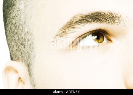 Junger Mann blickte, extreme Nahaufnahme des Gesichts Stockfoto