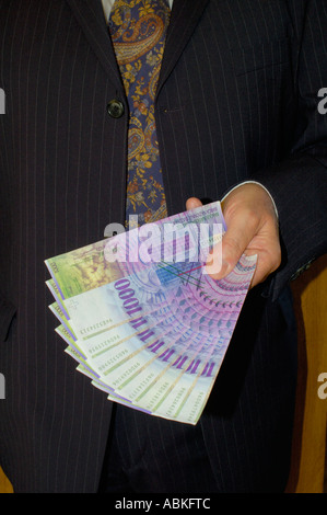 Nehmen Sie das Geld. Stockfoto