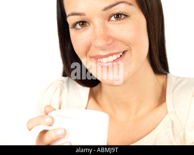 Junge Frau trinkt Tee Modell veröffentlicht Stockfoto