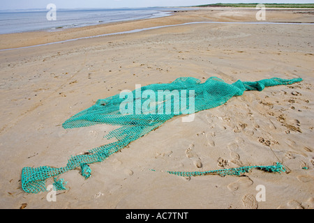 Verworfen, Fischernetz angespült am Strand Kintra Isle of Islay Schottland, Vereinigtes Königreich Stockfoto