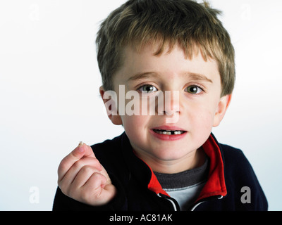 Kind verlieren Zahn Stockfoto