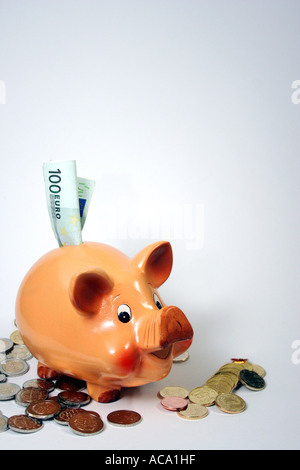 Sparschwein mit Euro-Münzen Stockfoto