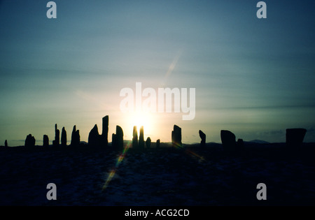 Prähistorischer Steinkreis Callanish ist über 5000 Jahre alt. Schottischen Hebriden Insel Lewis. Winter-Sonnenuntergang Stockfoto