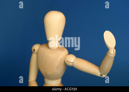 Künstler-Puppe mit einer Hand hob winken verabschieden Stockfoto