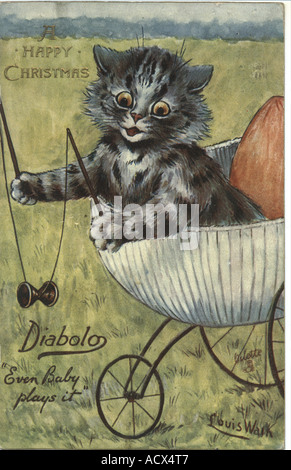 Weihnachten Gruß Postkarte Kätzchen spielen Diabolo von Louis Wain circa 1905 Stockfoto