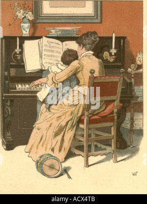 Mutter und Kind am Klavier um 1900 Stockfoto