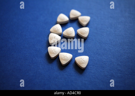 Dreieckige Ecstasy-Tabletten oder Pillen Stockfoto