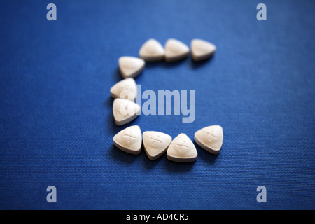 Dreieckige Ecstasy-Tabletten Stockfoto