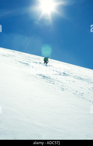 Skifahrer Abfahrt Stockfoto