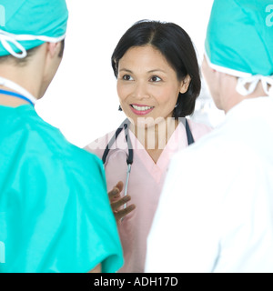 Ärzteteam konferieren Stockfoto