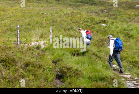 Wanderer auf dem West Highland Way Glen Coe Stockfoto