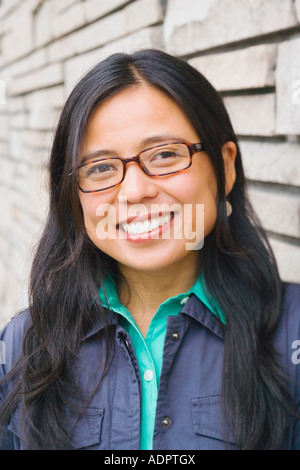Portrait von lächelnden jungen Frau Stockfoto