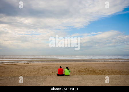 Fette Leute am Strand Stockfoto