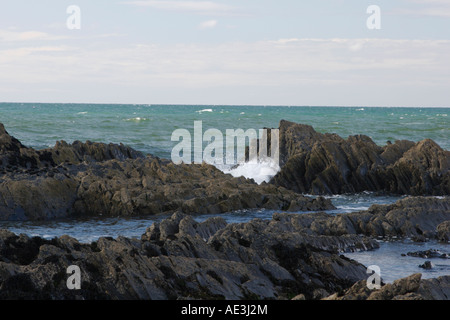 Flut über Fels-Pools am Strand von Aberystwyth, Wales Stockfoto