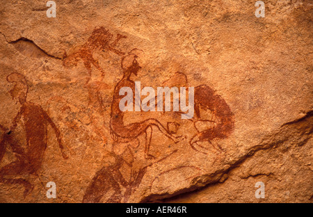 Libyen Akakus prähistorische Malereien auf Felsen Stockfoto