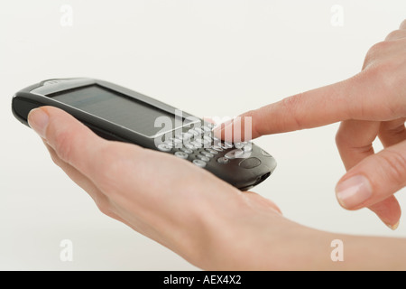 Frau mit einem smart-phone Stockfoto