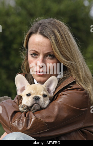 Französische Bulldogge (Canis Lupus F. Familiaris), Frau mit whelp Stockfoto