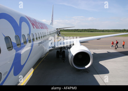 Passagiere in einem Flugzeug auf einem Flughafen Stockfoto