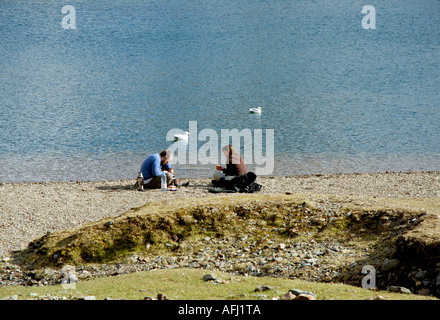 Wanderer auf nach außen gebunden Expedition auf Llwybr y Mwynwyr Bergarbeiter Track Snowdonia Nationalpark Mount Snowdon Yr Wyddfa Wales Britai Stockfoto