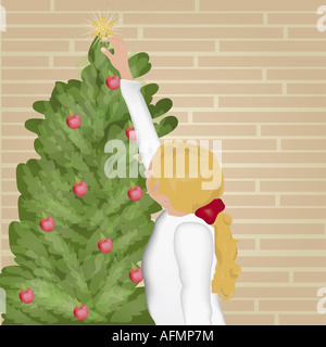 Mädchen, die einen Weihnachtsbaum Dekorationen aufsetzen Stockfoto