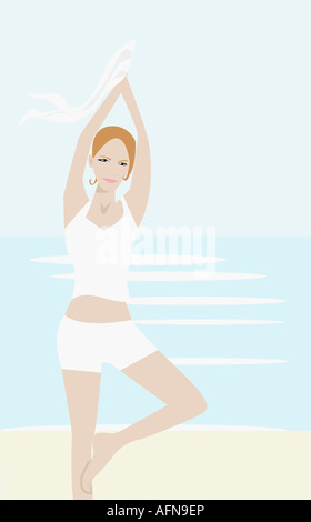 Junge Frau praktizieren Yoga am Strand Stockfoto