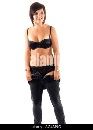 Frau, Modell veröffentlicht Jeans anziehen Stockfoto