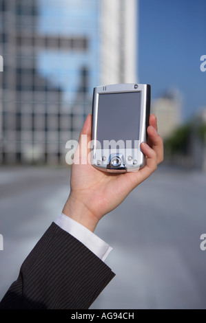 Nahaufnahme einer Frau Hand mit einem PDA Stockfoto
