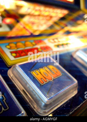 Hold-Taste auf Spielautomaten Stockfoto