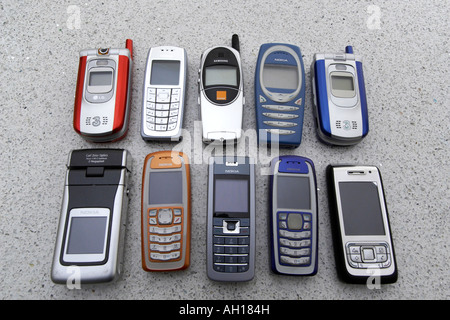 Acht Handys - nicht smart phones Stockfoto