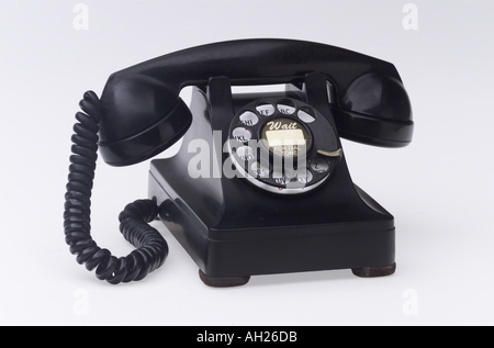 Retro, schwarz rotary Telefon Silhouette auf weißem Hintergrund Stockfoto