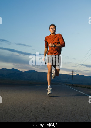 Mann in athletischer Gang laufen Stockfoto