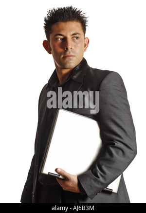 junger Mann im dunkelgrauen Anzug mit notebook Stockfoto