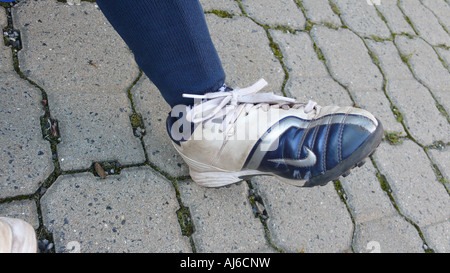 junge binden seine Fußballschuhe, Serie Bild 6/6 Stockfoto