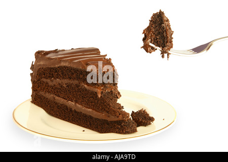 Reiche Schokolade Kuchen mit einem Schluck auf einer Gabel angehoben wird Stockfoto