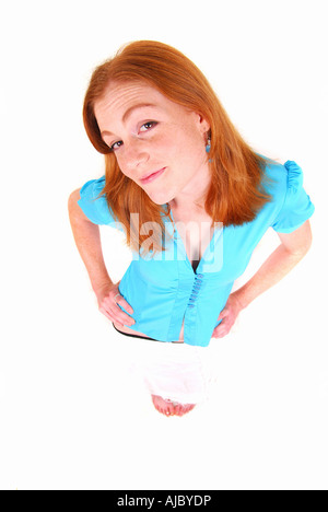 Junge Frau mit ihren Händen auf den Hüften - High Angle View Stockfoto
