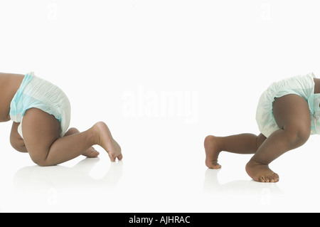 Babys krabbeln entfernt Stockfoto