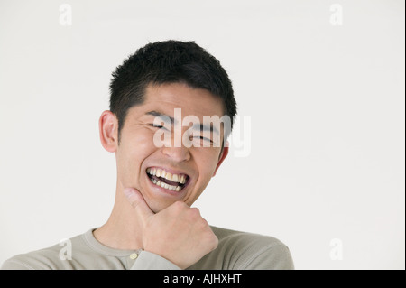 Porträt von Mitte erwachsener Mann Stockfoto