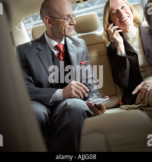 Geschäftsleute in einem taxi Stockfoto