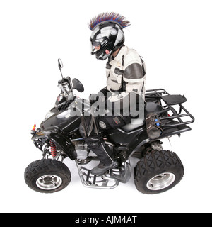 Quod Biker mit Helm und Fahrzeug Stockfoto